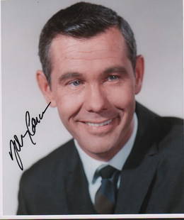 Johnny Carson signed photograph: A color signed 8x10 of the great late night host with COA