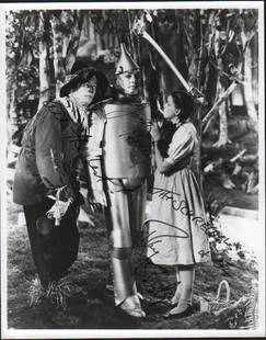 Wizard of Oz : Scarecrow and Tin Man: A scarce bw signed Oz 8x10 signed by both Ray Bolger as the Scarecrow and Jack Haley as the Tin Man with COA