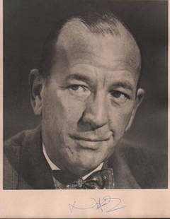 Noel Coward signed photograph: Scarce large 8x10 signed sepia toned photogrpah of the great playwright with COA