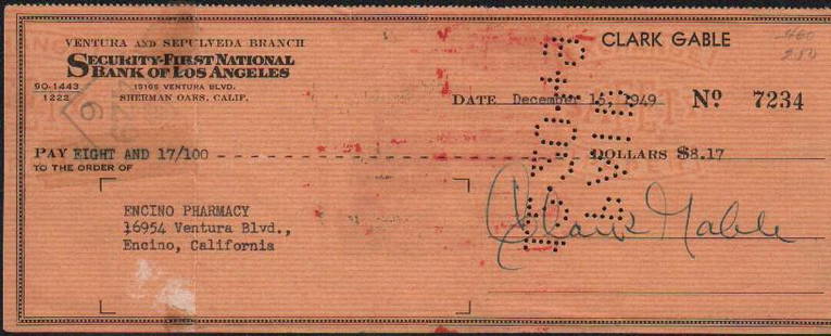 Clark Gable signed bank check: A check signed to the pharmacy by Clark Gable in 1949 the Gone with the Wind star with COA