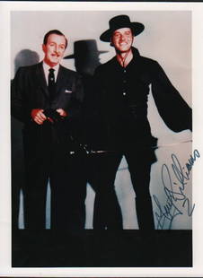 Guy Williams ZORRO signed photograph: A color vintage signed photograph as Zorro with Disney the shows creator signed adding a Z as well with COA