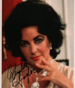 Elizabeth Taylor signed photograph: A gorgeous color vintage signed 8x10 of the actress with COA