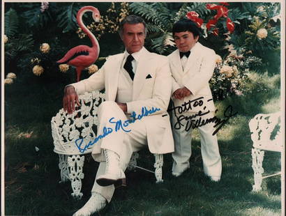 Fantasy Island 11x14: A scarce color 11x14 of the two stars both deceased Ricardo Montalban and Herve Villechaize who added his characters name TATTOO with COA