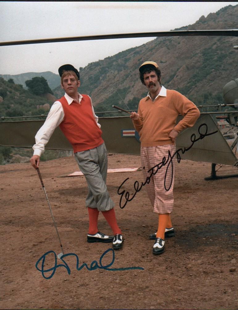 MASH by Elliott Gould and Donald Sutherland: MASH color 8x10 signed from the film that started the TV series by stars Donald Sutherland and Elliot Gould with COA
