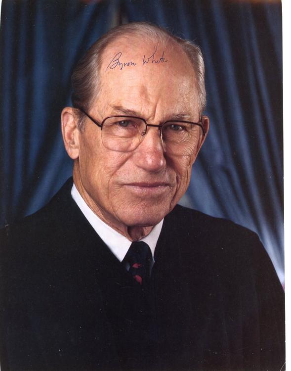 Byron White signed photograph: A color 8x10 of Supreme Court Justice Byron White signed by him with COA