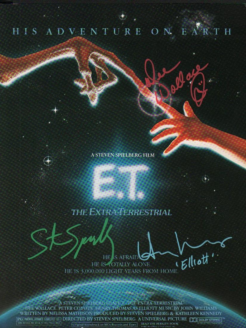 A premiere program signed on the cover by Henry Thomas: A premiere program signed on the cover by Henry Thomas (Elliott) his mom Dee Wallace and Director Steven Spielberg in various paint pen inks with COA