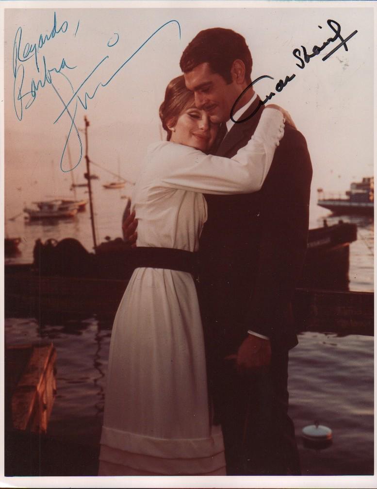 A vintage original color signed 8x10 from film by both: A vintage original color signed 8x10 from film by both stars Omar Shariff and Barbra Streisand with COA