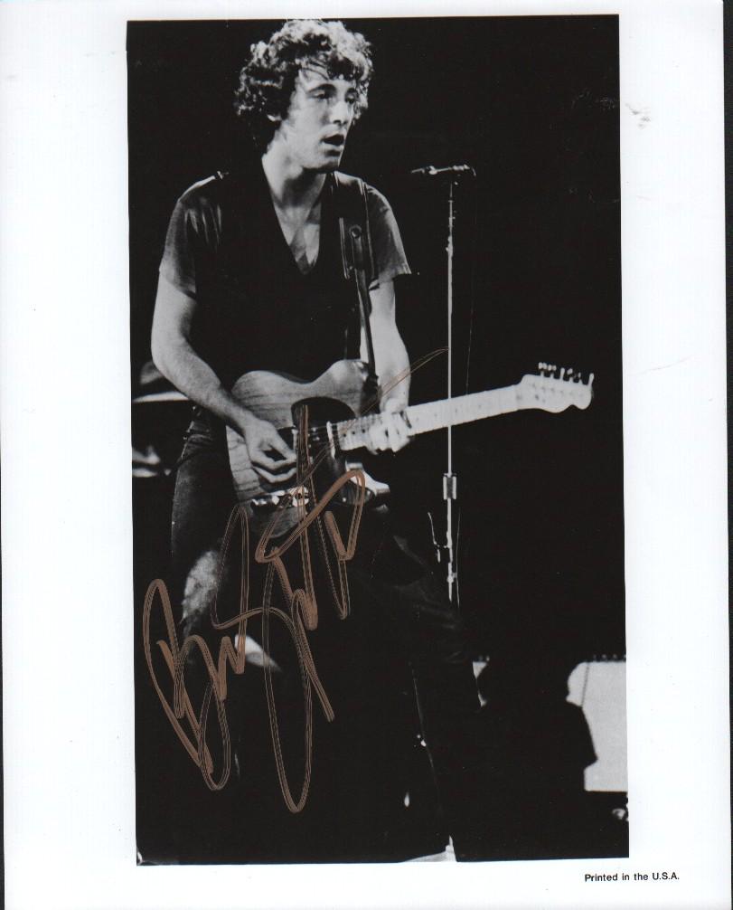 A fantastic Neal Preston 80s stage shot signed by the: A fantastic Neal Preston 80s stage shot signed by the BOSS with COA