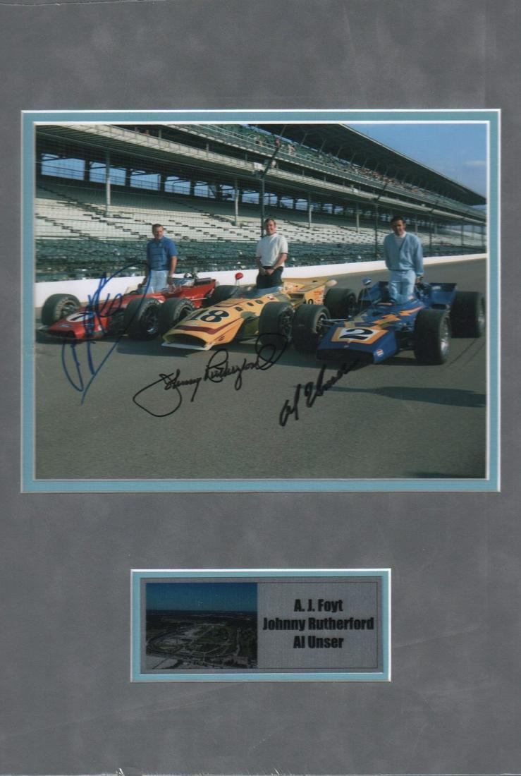 AJ Foyt Johnny Rutherford and Al Unser signed matted (1 of 1)