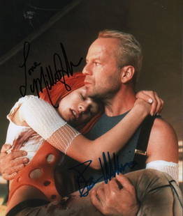 Fifth Element cast signed photograph: A color 8x10 signed by Bruce Willis and Milla Jovovich from the sci fi classic Fifth Element with COA