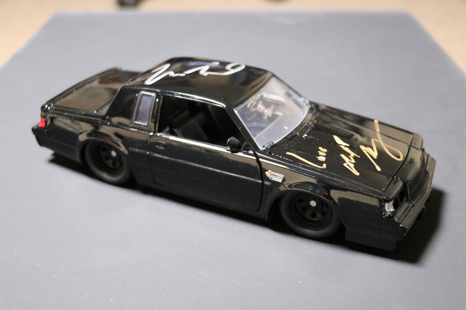 Fast and Furious Grand National diecast car 1:24 scale signed by Viin Diesel and Michelle Rodriguez: A die cast car the Grand National seen in the opening of Fast Four signed by both stars who were in it Vin Diesel and Michelle Rodriguez with COA