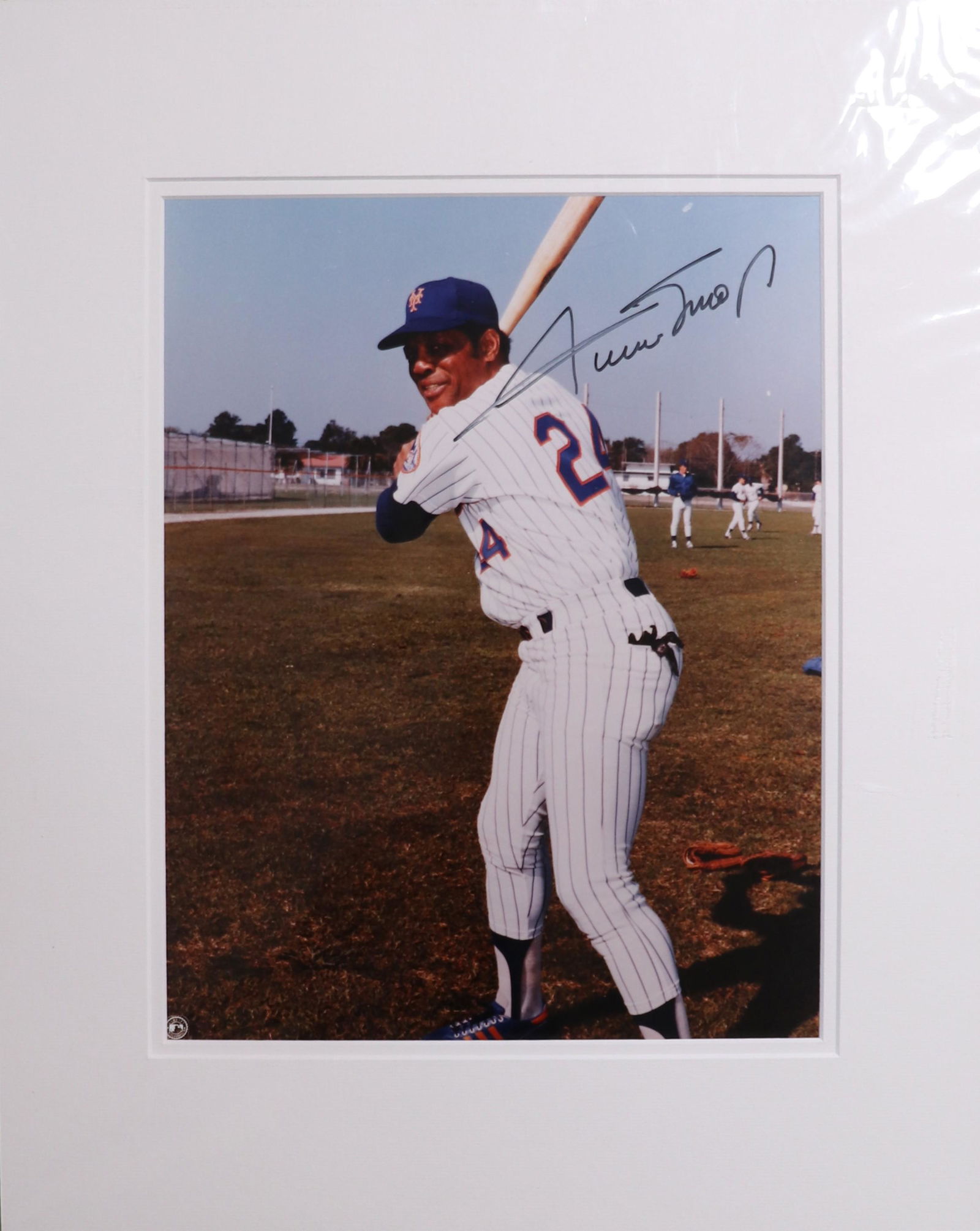 Willie Mays signed 11x14 photograph: A vintage signed 11x14 matted of Willie Mays signed decades ago by the baseball HOF legend with COA