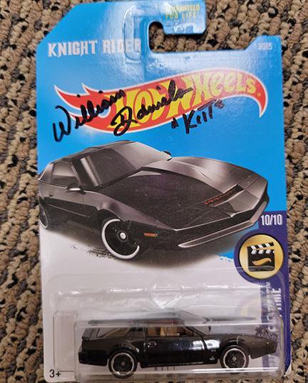 William Daniels signed KITT matchbox car: A matchbox car in package of KITT the taling car in TVS Knight Rider signed by the voice actor William Daniels with COA