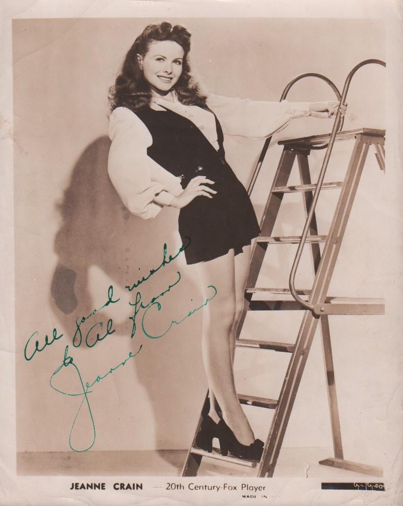 Jeanne Crain vintage signed photograph: A sexy sepia toned 20th Century Fox 8x10 signed in the 40s by her in fountain pen ink with COA