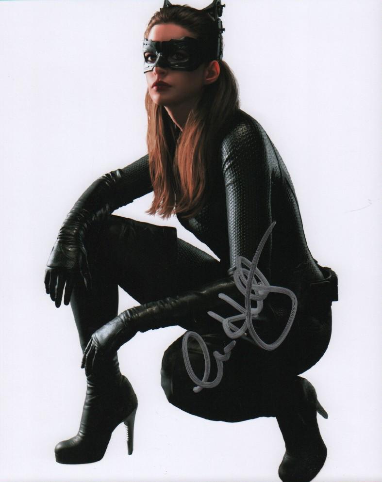 Anne Hathaway signed Catwoman photograph: A color sexy Catwoman signed 8x10 from Batman films with COA