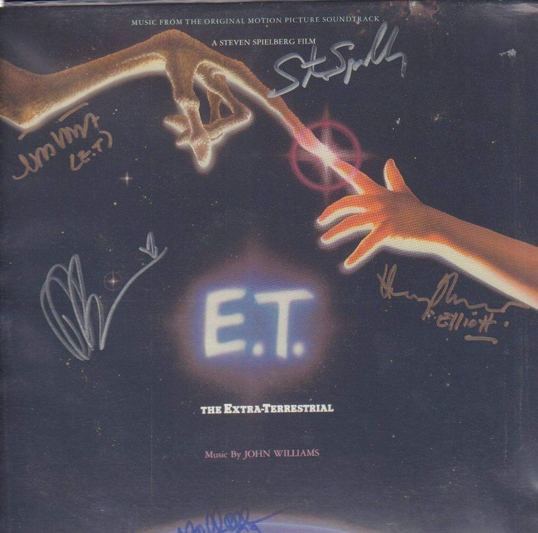 ET soundtrack cast signed LP: A soundtrack LP to ET signed by Director Steven Spielberg and stars Dee Wallace Stone Henry Thomas Drew Barrymore and Merritt who was in ET suit with COA