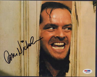 Jack Nicholson Shining signed photograph: A color 8x10 signed of the famed Heeeeres Johnny scene with PSA DNA sticker and card and our own guaranteed COA