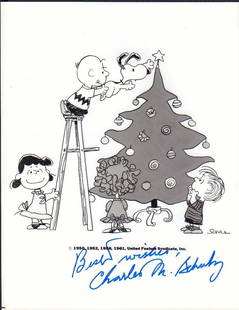 Charles M Schulz signed Peanuts photo: An original Charlie Brown Christmas signed still by creator cartoonist Charles Schulz who signed it in FULL with COA