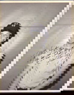 Elvis Presley incredible signed photo: Incredible heavyweight perhaps unpublished 8x10 of Elvis from a film with long inscription to his makeup person Mr George with COA