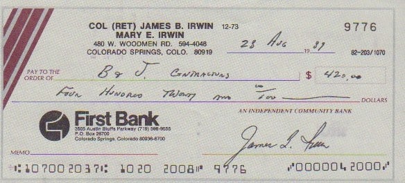 Jim Irwin signed bank check