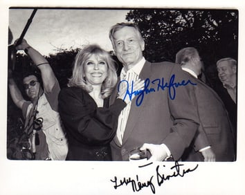 Hugh Hefner and Nancy Sinatra signed photograph