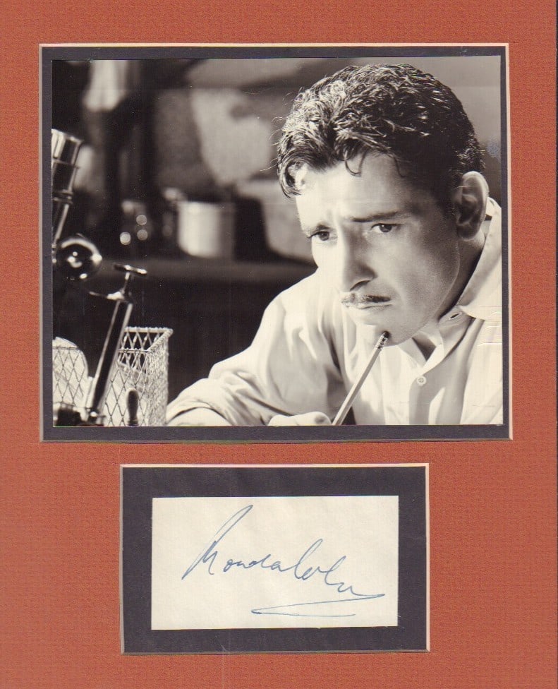 Ronald Coleman signature: Rare vintage signature matted with vintage still of Oscar winner This item comes with a fully illustrated serial numbered letter of authenticity guaranteeing its authenticity for the life of the piece
