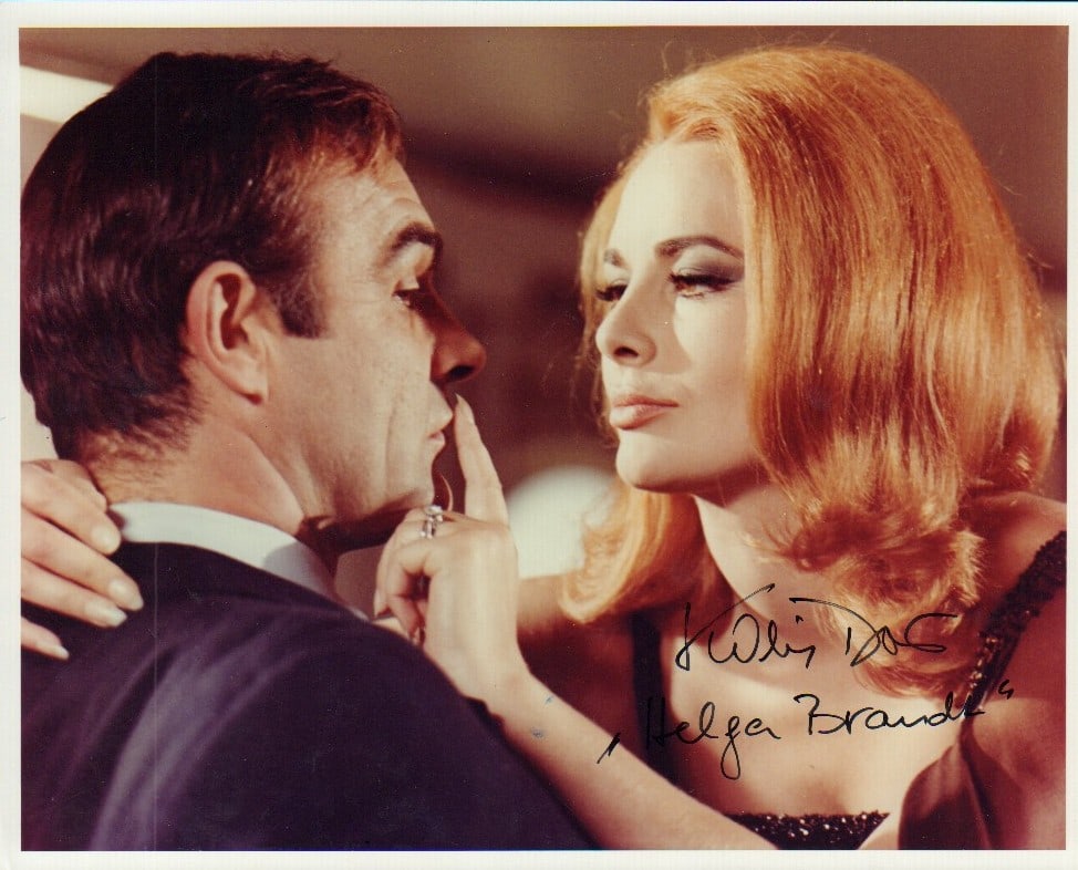 Karin Dor signed James Bond photograph: Rare Bond babe with Connery she has added her characters name Helga Brandt and signed deceased This item comes with a fully illustrated serial numbered letter of authenticity guaranteeing its authenti