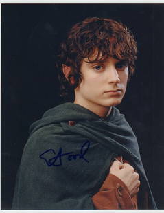 Elijah Wood signed photograph: Nice shot as Frodo in Lord of the Rings signed by him This item comes with a fully illustrated serial numbered letter of authenticity guaranteeing its authenticity for the life of the piece and is