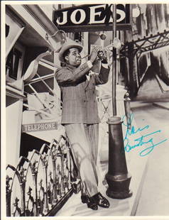 Louis Armstrong signed photograph: A vintage still signed in aqua colored fountain pen ink by the great Satchmo himself ! Deceased This item comes with a fully illustrated serial numbered letter of authenticity guaranteeing its
