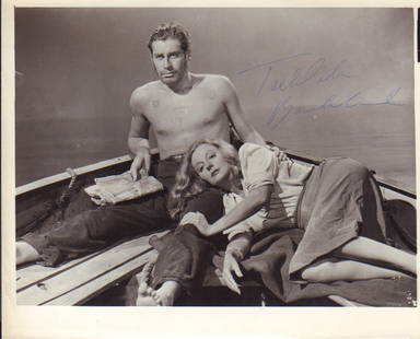 Tallulah Bankhead signed photograph: A rare original Lifeboat still from Hitchcock classic signed by her in ballpoint pen ink Deceased This item comes with a fully illustrated serial numbered letter of authenticity guaranteeing its
