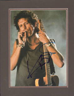 Keith Richards signed photograph matted: A vintage signed 9x11 of the famed Stones guitarist taken from a coffee table book of prints matted years ago to a larger size as shown This item comes with a fully illustrated serial numbered