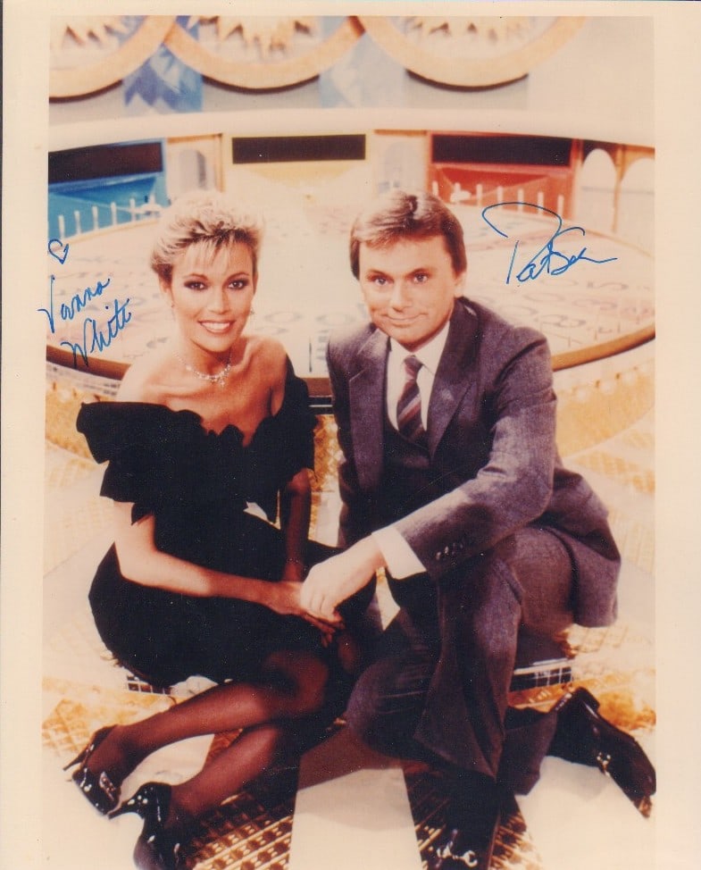 Wheel of Fortune signed photo: A vintage signed 8x10 by Pat Sajak and Vanna White both This item comes with a fully illustrated serial numbered letter of authenticity guaranteeing its authenticity for the life of the piece and is s