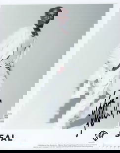 Seal signed photo: A signed 8x10 by singer This item comes with a fully illustrated serial numbered letter of authenticity guaranteeing its authenticity for the life of the piece and is searchable online at