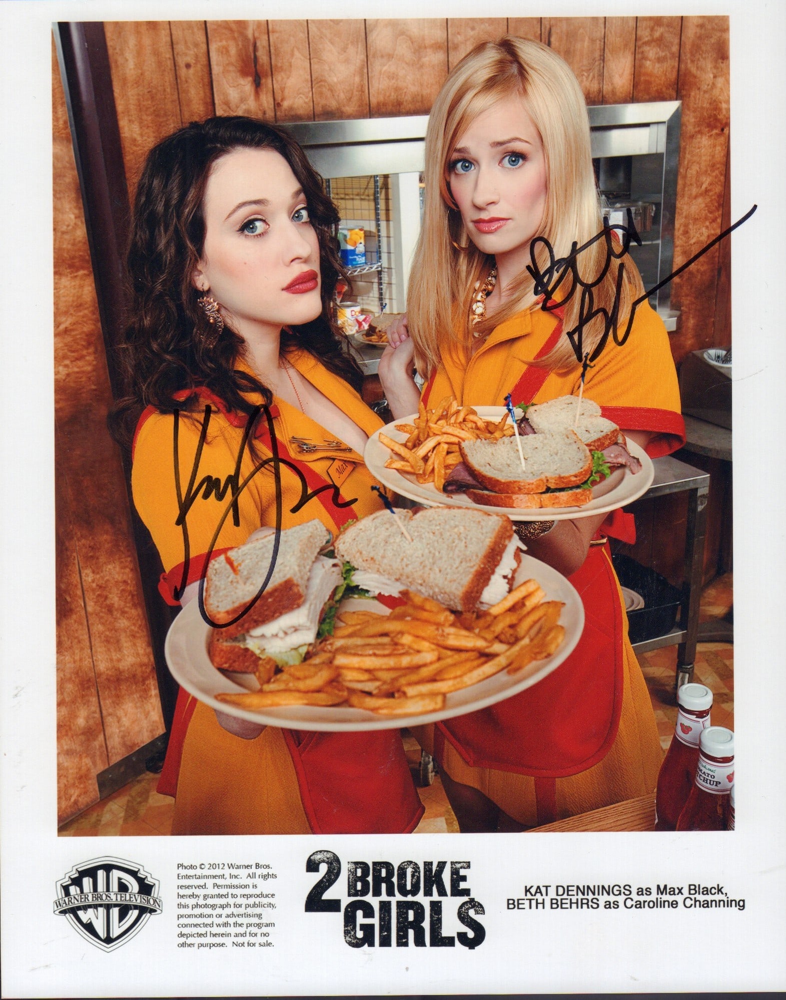 Two Broke Girls cast signed photo: Signed during the shows debut for a network exec by both stars Beth Behrs and Kat Dennings This item comes with a fully illustrated serial numbered letter of authenticity guaranteeing its authenticity