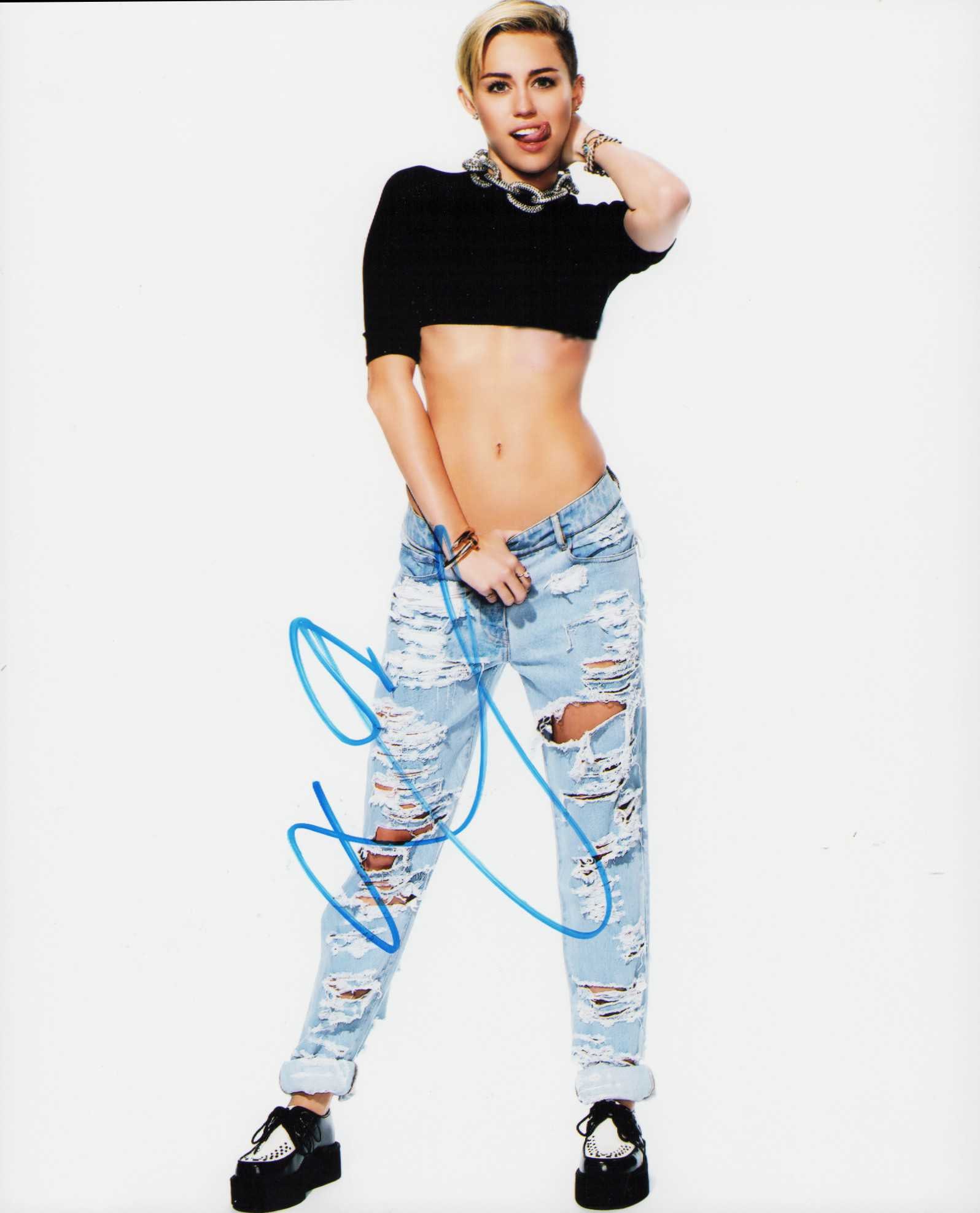 Miley Cyrus signed photograph (1 of 1)