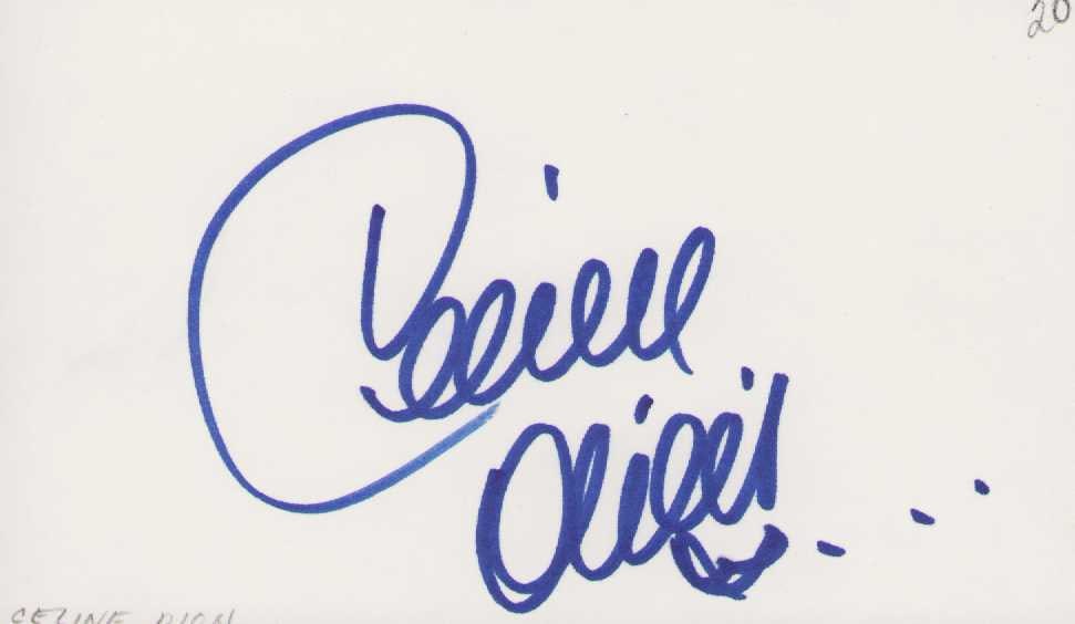 Celine Dion signature: A nice in person signed card by the singing legend Certificate of AuthenticityEVERY item in this auction comes with at minimum a full illustrated serial numbered COA signed by the worlds leading authe