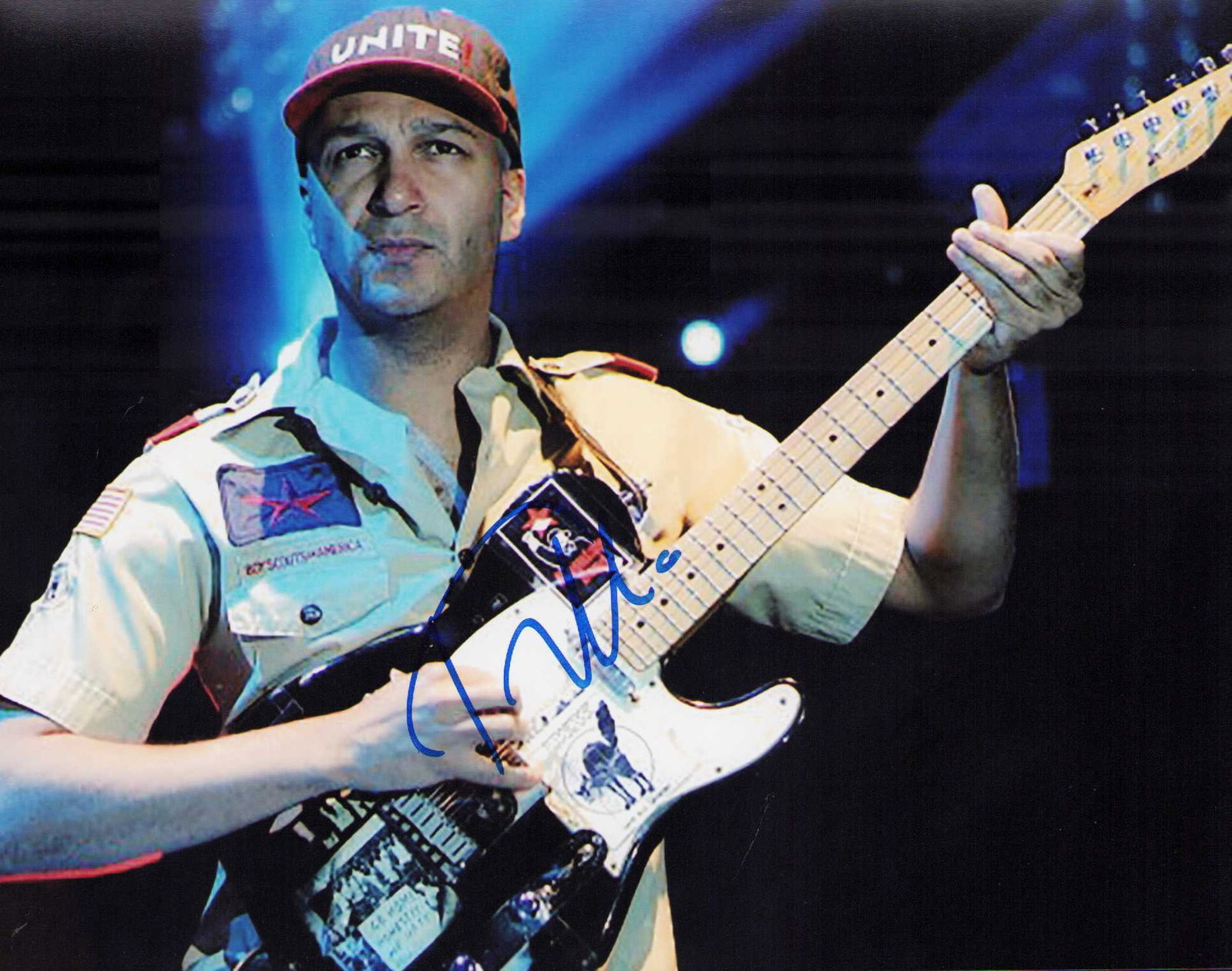 Tom Morello signed photo: Signed 8x10 on stage Certificate of AuthenticityEVERY item in this auction comes with at minimum a full illustrated serial numbered COA signed by the worlds leading authenticator in Entertainment KEVI