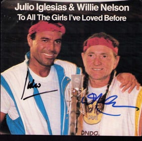 Julia Iglesisas and Willie Nelson signed 45rpm picture sleeve with record