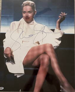 Sharon Stone 16x20 signed photograph PSA DNA: A PSA DNA signed 16x20 photograph of THE scene from Basic Instinct scarce in this size Certificate of AuthenticityEVERY item in this auction comes with at minimum a full illustrated serial numbered