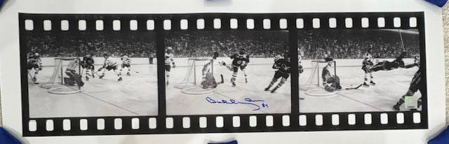 Bobby Hull signed action print: A rare 9x36 action shot signed by the hockey legend with paperwork from company who did signing Certificate of AuthenticityEVERY item in this auction comes with at minimum a full illustrated serial nu