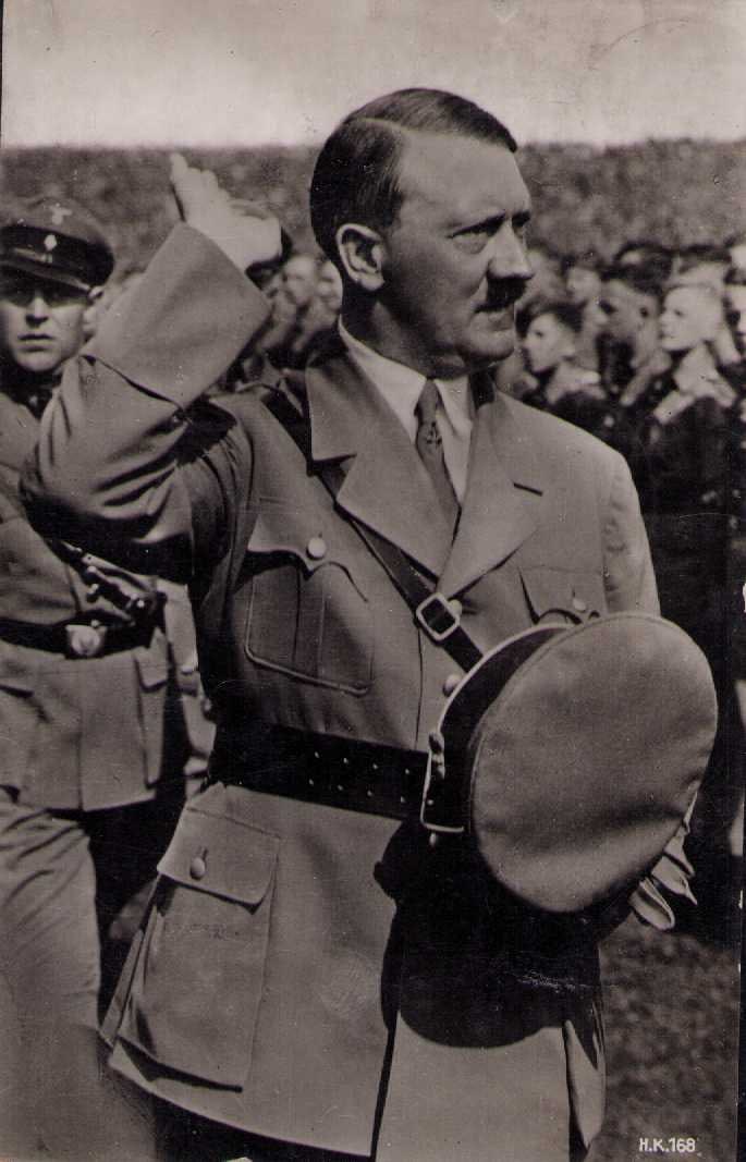 Rare Postally send Hitler photo postcard: A rare postcard featuring real life photo of Hitler sent during war with war date cancellations an stamps on reverse