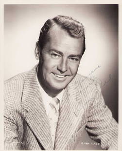 Alan Ladd signed photograph: A heavweight signed 8x10 portrait nicely signed in fountain pen ink Certificate of AuthenticityEVERY item in this auction comes with at minimum a full illustrated serial numbered COA signed by the wor