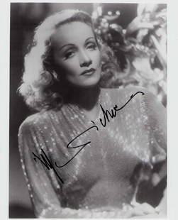 Marlene Dietrich signed photograph: A nice vintage signed 8x10 by the German film legend Certificate of AuthenticityEVERY item in this auction comes with at minimum a full illustrated serial numbered COA signed by the worlds leading aut