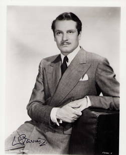 Lawrence O'Livier signed photograph: A nice vintage signed by the legendary actor very elegant Certificate of AuthenticityEVERY item in this auction comes with at minimum a full illustrated serial numbered COA signed by the worlds leadin