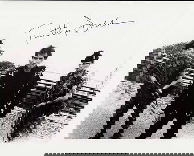 Timothy Dalton James Bond signed photograph: The rarest of the Bond signers on a vintage Bond still Certificate of AuthenticityEVERY item in this auction comes with at minimum a full illustrated serial numbered COA signed by the worlds leading a
