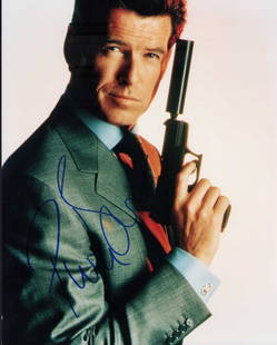 Pierce Brosnan James Bond signed photograph: As James Bond signed 8x10 in person Certificate of AuthenticityEVERY item in this auction comes with at minimum a full illustrated serial numbered COA signed by the worlds leading authenticator in Ent