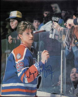 Wayne Gretzky signed photograph: On the ice signed by the hockey legend Certificate of AuthenticityEVERY item in this auction comes with at minimum a full illustrated serial numbered COA signed by the worlds leading authenticator in
