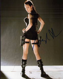 Angelina Jolie Tomb Raider signed photograph: A sexy Tomb Raider signed 8x10 by her Certificate of AuthenticityEVERY item in this auction comes with at minimum a full illustrated serial numbered COA signed by the worlds leading authenticator in E