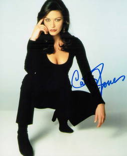 Catherine Zeta Jones signed photograph: A sexy Entrapment signed 8x10 photograph Certificate of AuthenticityEVERY item in this auction comes with at minimum a full illustrated serial numbered COA signed by the worlds leading authenticator i