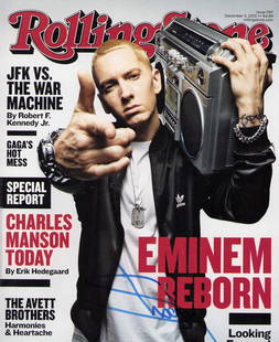Eminem signed Rolling stones magazine: A complete Rolling Stone magazine signed on cover by singer EMINEM Certificate of AuthenticityEVERY item in this auction comes with at minimum a full illustrated serial numbered COA signed by the worl